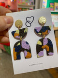 Boucle d’oreille forme aléatoire